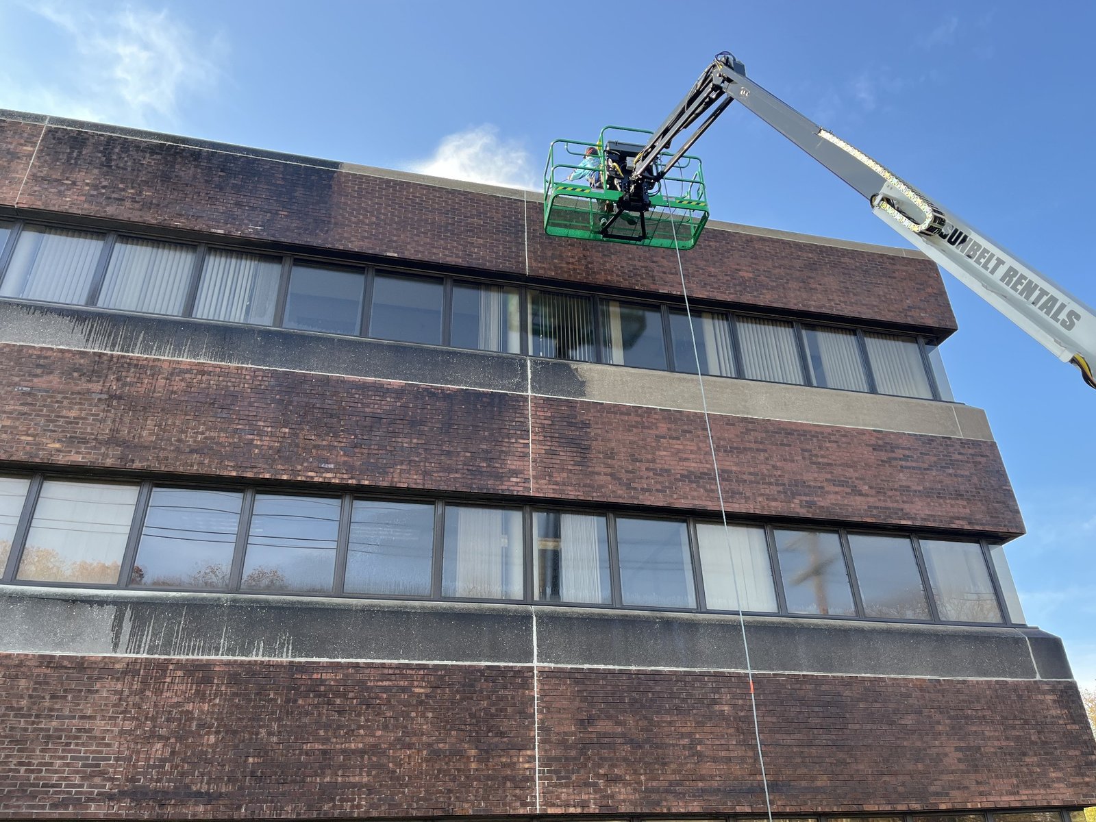 Aqua Boy commercial building washing from a boom lift in Cherry Hill New Jersey